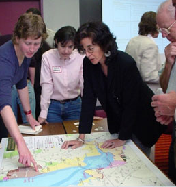 People around table map