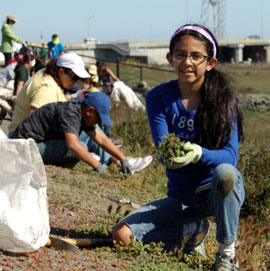 Girl at Earth day event. Photo by Judy Irving, Pelican Media