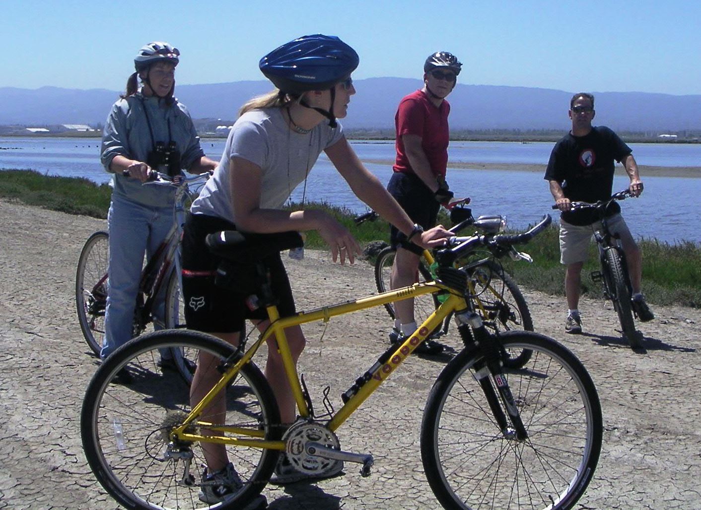 Bicyclists tour trails near Moffett Field, Alviso ponds