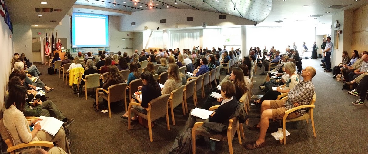 Attendees at an earlier, in-person symposium. Credit: Ben Young Landis