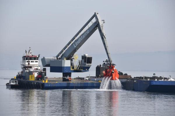 Dredged sediments are loaded on a scow bound for Eden Landing. Credit: U.S. Army Corps of Engineers