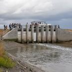 For the first time in decades, the waters of Pond A8 and the San Francisco Bay comingled as the first dam gate was opened. Credit: Judy Irving, Pelican Media.