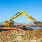 Digging through a levee. Credit: Julie Kitzenberger