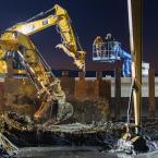 Pond A2W: workers breach levees in winter darkness. Credit: Charles Anderson, Epicycle Media