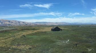 Ghost town Drawbridge, California, seen from train tracks passing over the Don Edwards Wildlife Refuge. Photo by Dargaseay 